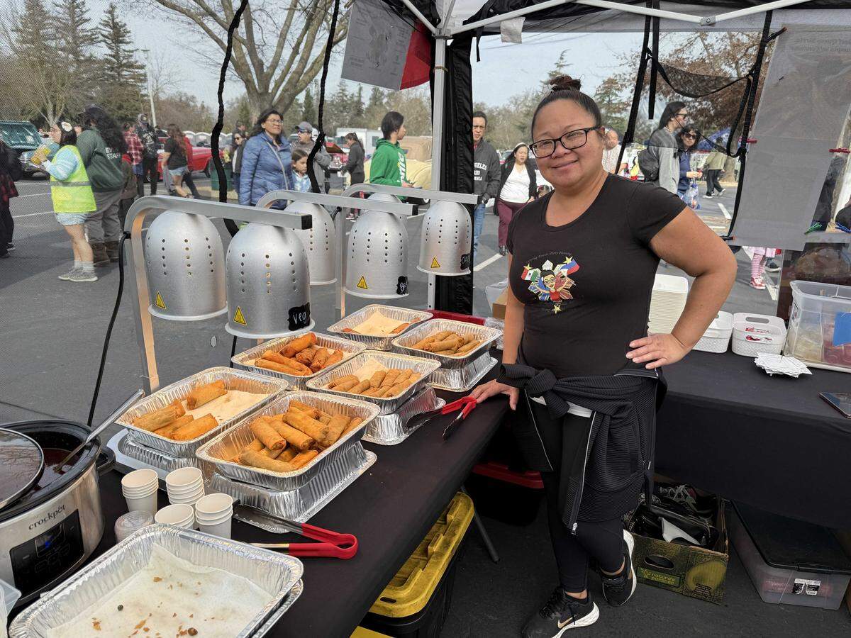 Kathleen Rapisura-Pardo makes fusion lumpia for her My Lumpia Lady booth at the Lunar New Year Tet Festival & Parade in Elk Grove on Saturday, Feb. 14. She began her business in 2020, during the COVID-19 pandemic shutdown.