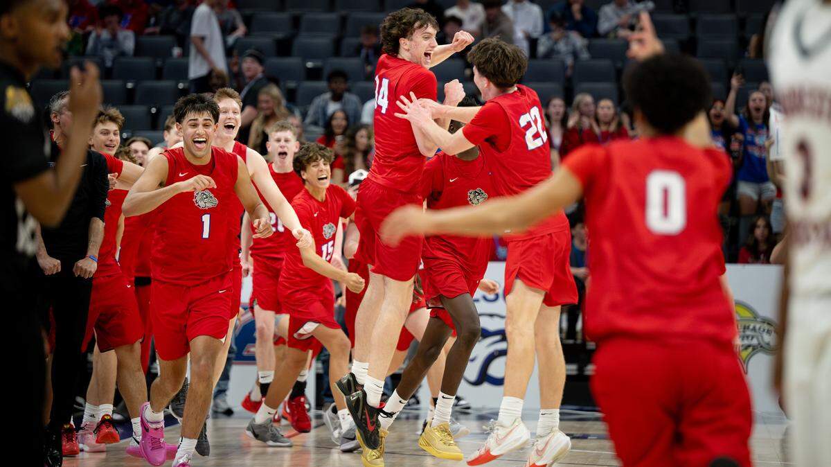 Folsom players celebrate their 62-52 victory over Modesto Christian in the Sac-Joaquin Section Division I championship game at Golden 1 Center on Friday.