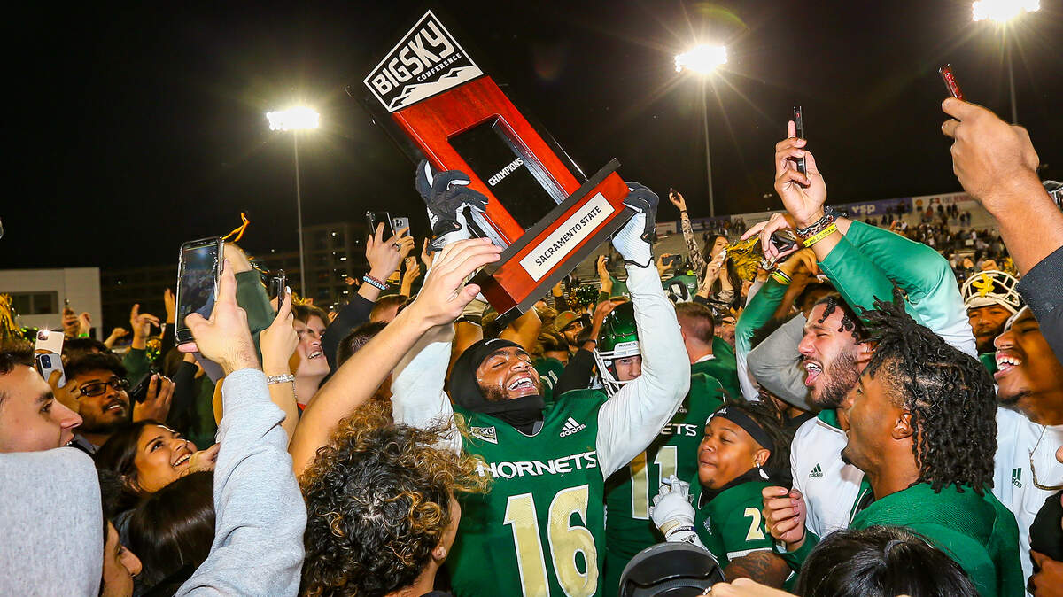 Sacramento State tight end Marshel Martin was emotional in hoisting the Big Sky Conference championship trophy after beating rival UC Davis in the Causeway Classic on Nov. 19.