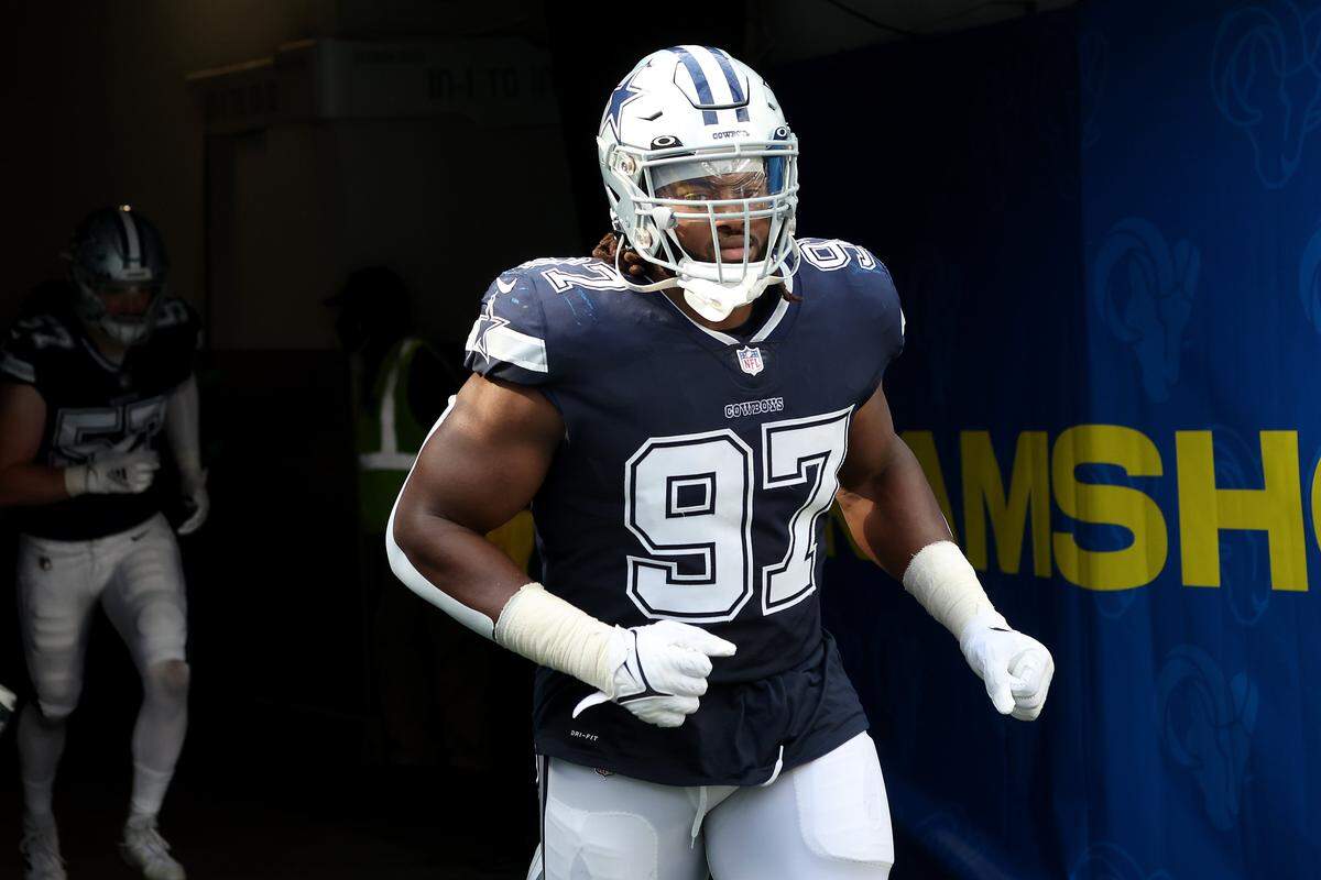 INGLEWOOD, CALIFORNIA - OCTOBER 09: Osa Odighizuwa #97 of the Dallas Cowboys enters the stadium prior to a game against the Los Angeles Rams during the first half of a game at SoFi Stadium on October 09, 2022 in Inglewood, California. (Photo by Ronald Martinez/Getty Images)