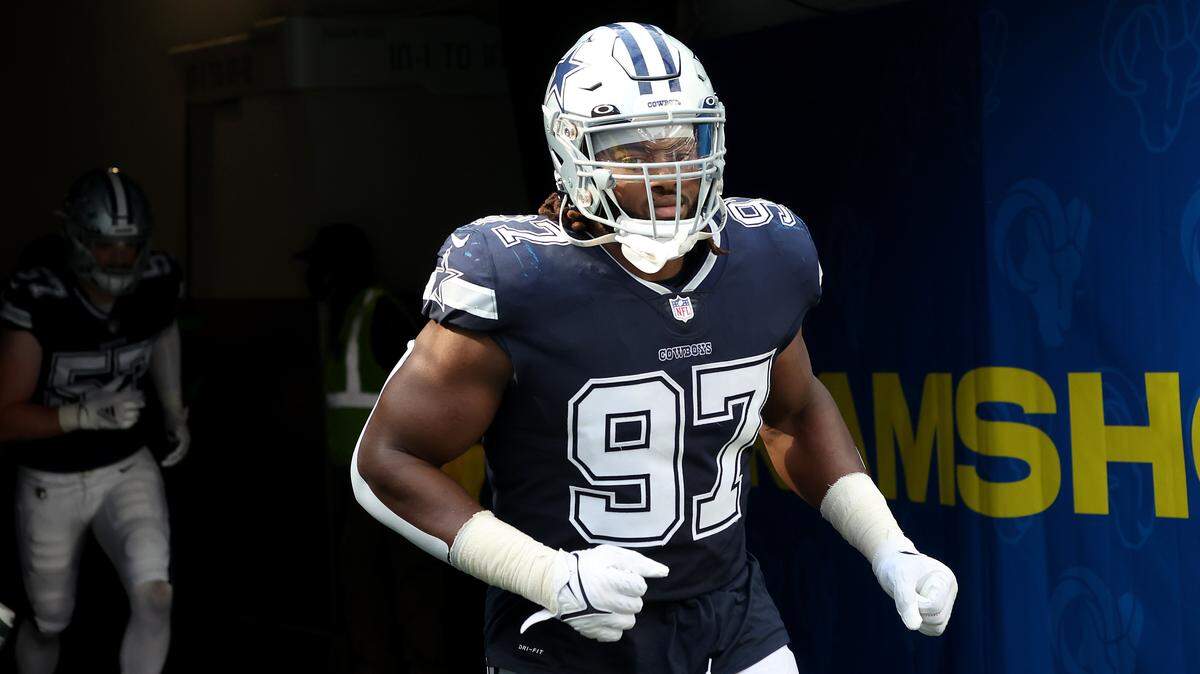 INGLEWOOD, CALIFORNIA - OCTOBER 09: Osa Odighizuwa #97 of the Dallas Cowboys enters the stadium prior to a game against the Los Angeles Rams during the first half of a game  at SoFi Stadium on October 09, 2022 in Inglewood, California. (Photo by Ronald Martinez/Getty Images)