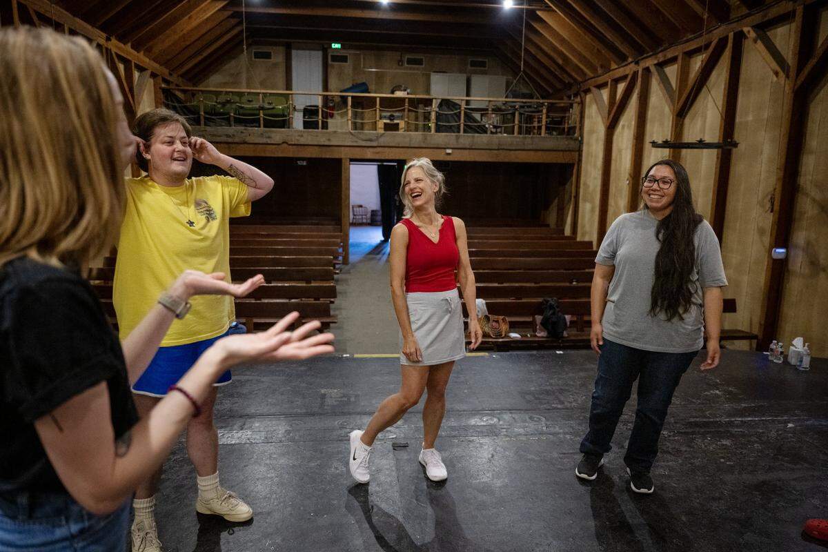 Haus of Comedy students August Wheeler, Erin Kew, and Mariam Ol take instruction frorm Jessilee Windhaus during a class at The Eagle Theatre in Sacramento on Thursday, May 14, 2026.
