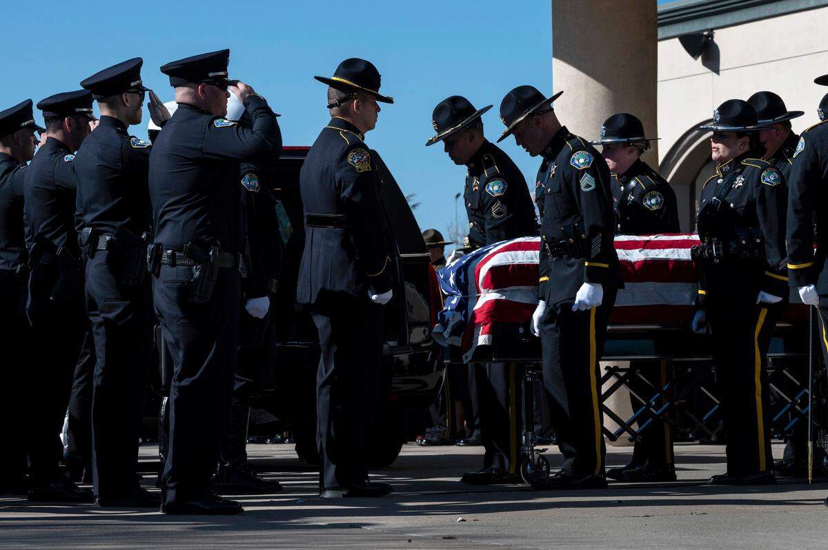 The casket carrying Elk Grove police officerTyler Lenehan, 44, is placed in a hearse on Feb 1, 2022, outside Bayside Church Adventure Campus in Roseville. The Elk Grove officer died Jan. 21, following a traffic collision on Highway 99 near 47th Avenue in Sacramento.