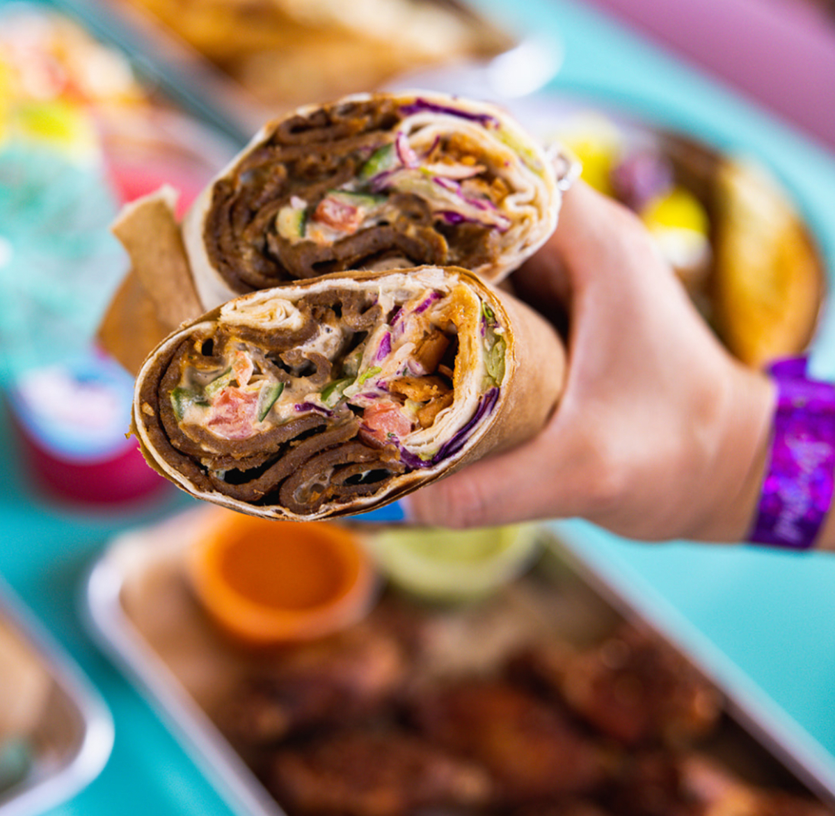 Spitz Mediterranean Street Food’s menu includes a range of doner wraps, a Turkish street food featuring spit-roasted seasoned meat, vegetables like tomatoes, cabbage and cucumber and tzatziki sauce. Spitz’s take on the wrap comes with three choices of animal protein or chickpea-based falafel.