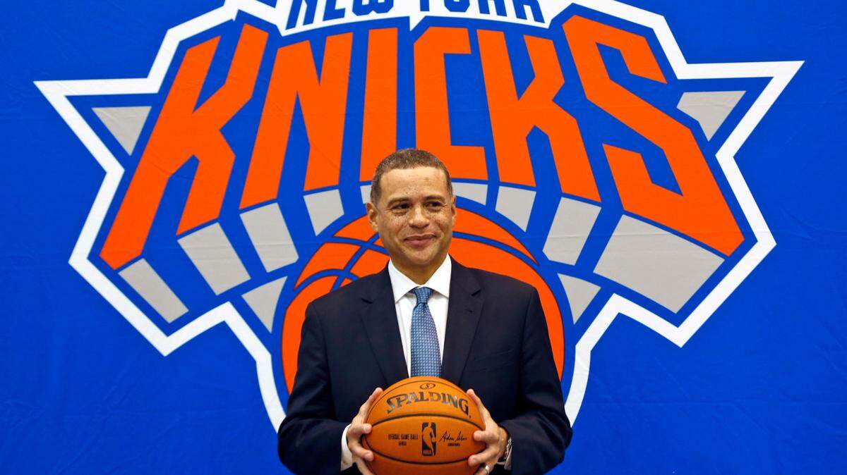 FILE - In this July 17, 2017, file photo, New York Knicks general manager Scott Perry poses for a picture after a news conference in Greenburgh, N.Y. Scott Perry will remain general manager of the New York Knicks after agreeing to a new one-year deal with the team Wednesday, April 29, 2020. (AP Photo/Seth Wenig, File)