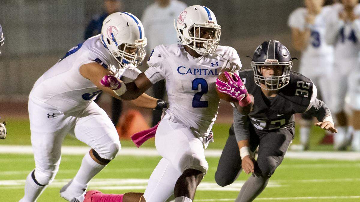 D’Marcus Ross (2) has rushed for 1,650 yards and 17 touchdowns for Capital Christian, the No. 1 seed in Division III in the Sac-Joaquin Section playoffs. Unbeaten Capital Christian runs a multiple pistol offense under coach Casey Taylor.