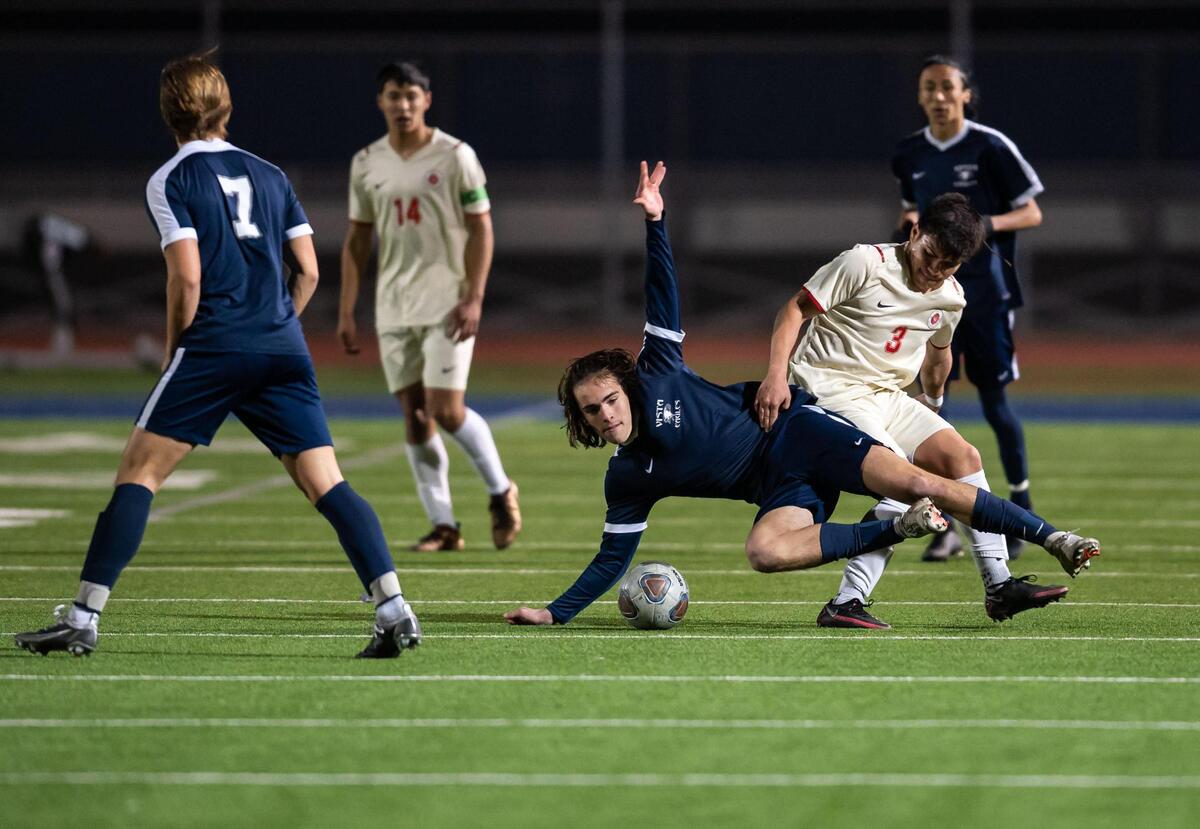 Galt’s Enrique Hernandez, right, vies with Vista del Lago’s Elijah Zackney for possession of the ball during the second half of the high school boys soccer Sac-Joaquin Section playoff game Tuesday, Feb. 15, 2022, at Vista del Lago High School in Folsom. Vista del Lago beat Galt 6-1.