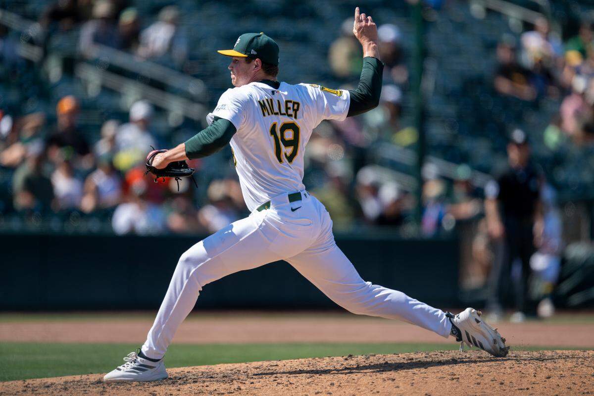 Athletics pitcher Mason Miller (19) throws a pitch in the ninth inning during a baseball game against the Toronto Blue Jays at Sutter Health Park in West Sacramento on Sunday.