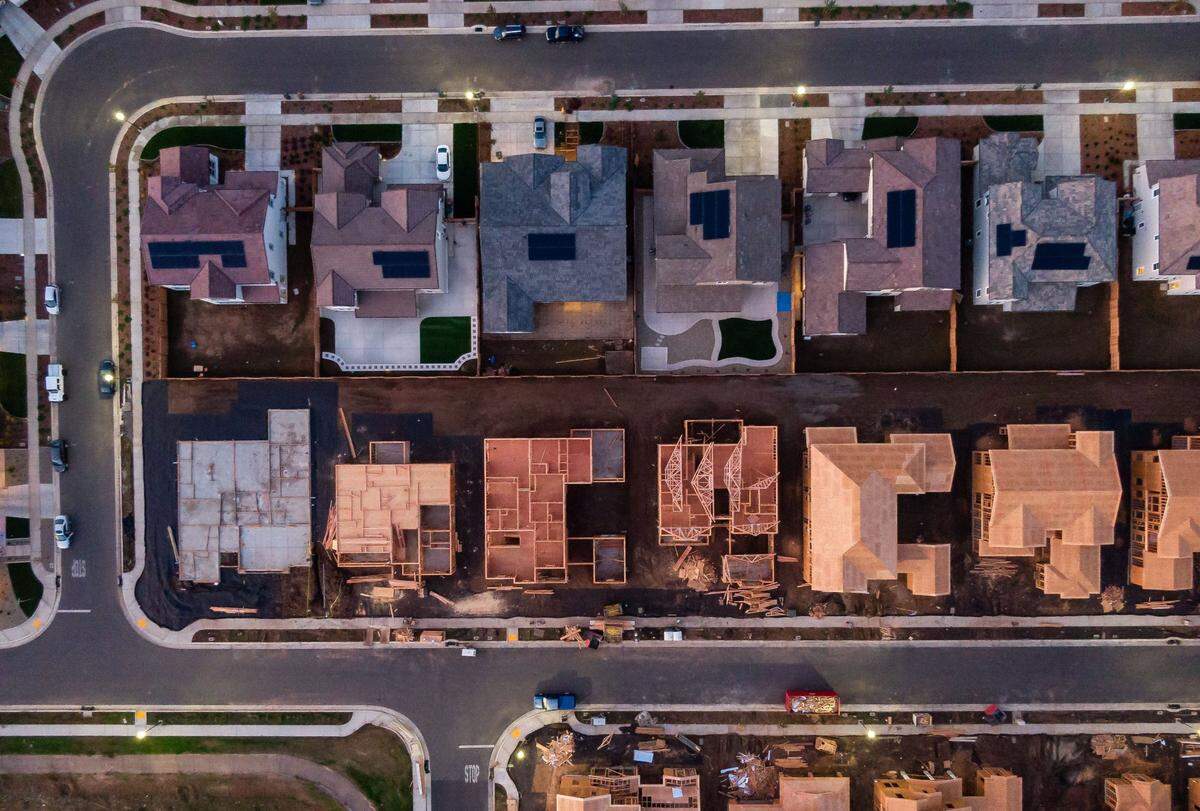 Homes under various stages of construction are seen between Amonde Way and Fortaleza Avenue as part of the Madeira Meadows development Wednesday, Nov. 17, 2021, at the southern end of Elk Grove.