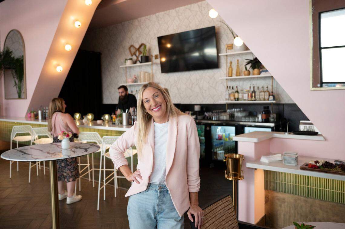 Cabana Club owner Paula Thompson stands Wednesday in her new Palm Springs-inspired cocktail lounge and eatery located in Sacramento’s Downtown Commons.