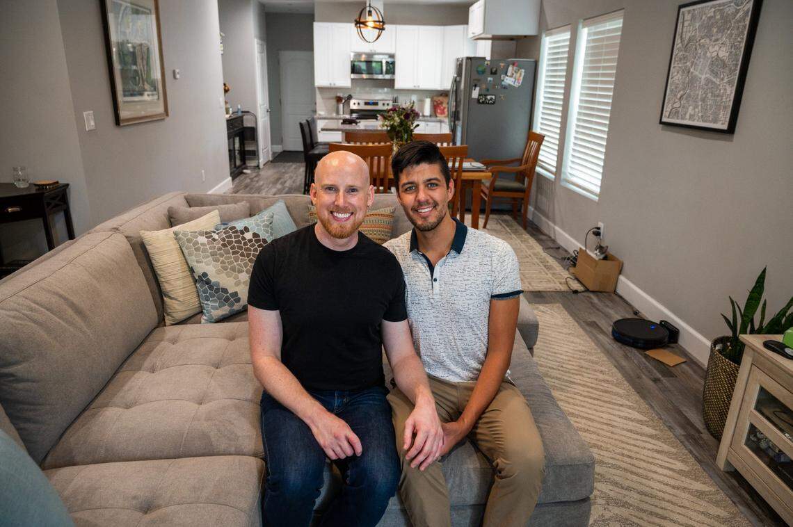 Noel Pacheco, left, and Emilio Perez in their Oak Park home last month. The couple spent several months searching for a home after they wed. They ended up paying $730,000 for their 1,300 square-foot, three-bedroom, two-bathroom Oak Park house with an accessory dwelling unit on the property.