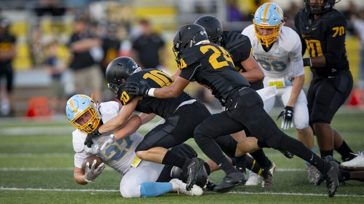 Center High running back Legend Young is tackled during the season opener against Rio Linda on Aug. 23. Center (12-0) seeks its first section title when it faces Ripon in the Sac-Joaquin Section Division V title game Saturday at Hughes Stadium.