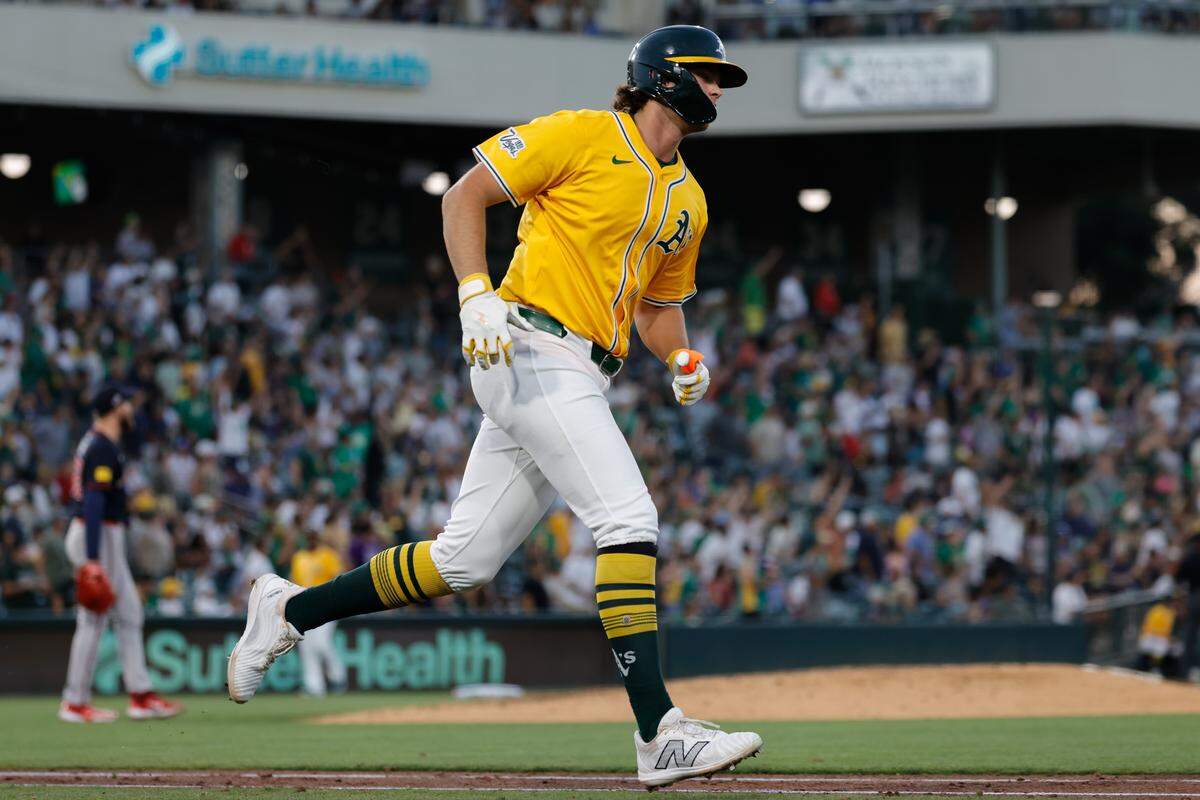 Jul 10, 2025; West Sacramento, California, USA; Athletics first baseman Nick Kurtz (16) hits a one run home run during the eighth inning against the Atlanta Braves at Sutter Health Park. Mandatory Credit: Sergio Estrada-Imagn Images