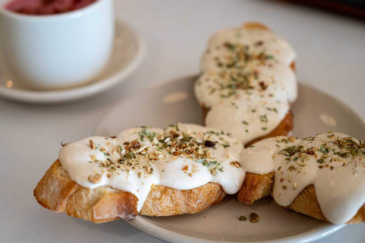 Tartine, sliced bread with a sweet or savory topping, is available at Ever After Wine in Elk Grove on Wednesday. Tartine at Ever After Wine is served with house-made ricotta, honey and rosemary salt.