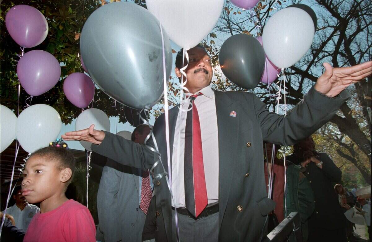 Rev. Jesse Jackson makes his way from the podium after his speech at a rally during one-day strike at Hillhaven Nursing Home on Folsom Boulevard on Nov. 13, 1995.