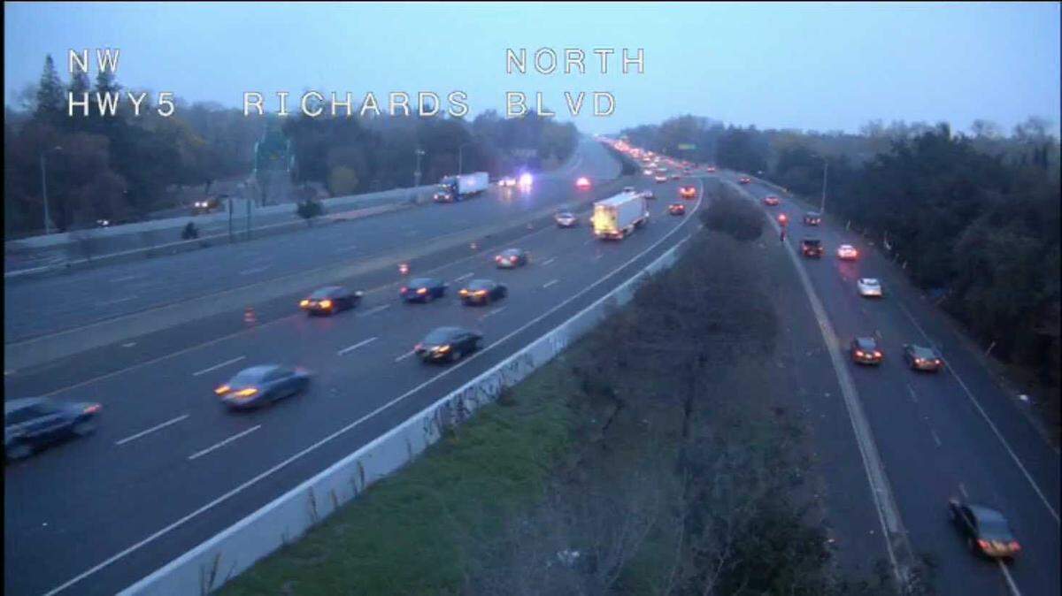 Authorities closed the southbound lanes of Interstate 5 from Interstate 80 to Richards Boulevard as the California Highway Patrol investigated a shooting Monday Dec. 6, 2021, in Sacramento, California.