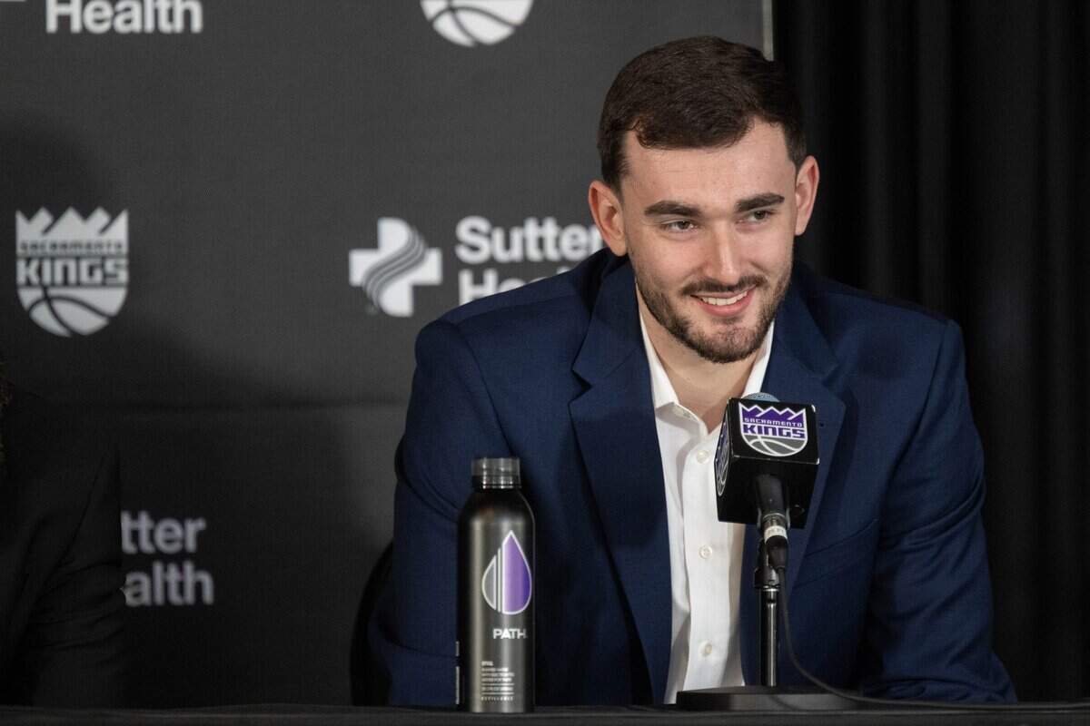 Sacramento Kings 2026 NBA draft pick Alex Karaban listens to a question during an introductory news conference at Golden 1 Center on Monday.