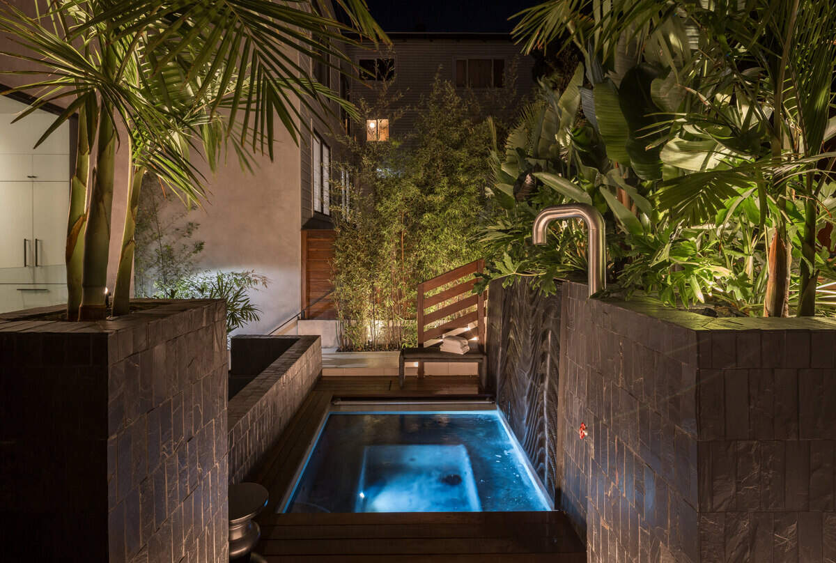 A lush courtyard is the centerpiece.