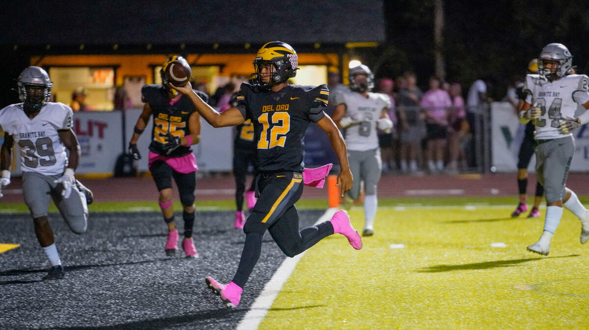 Del Oro quarterback Caden Pinnick (12) scored two total touchdowns in a 21-10 win over Granite Bay. The Golden Eagles are 6-0.