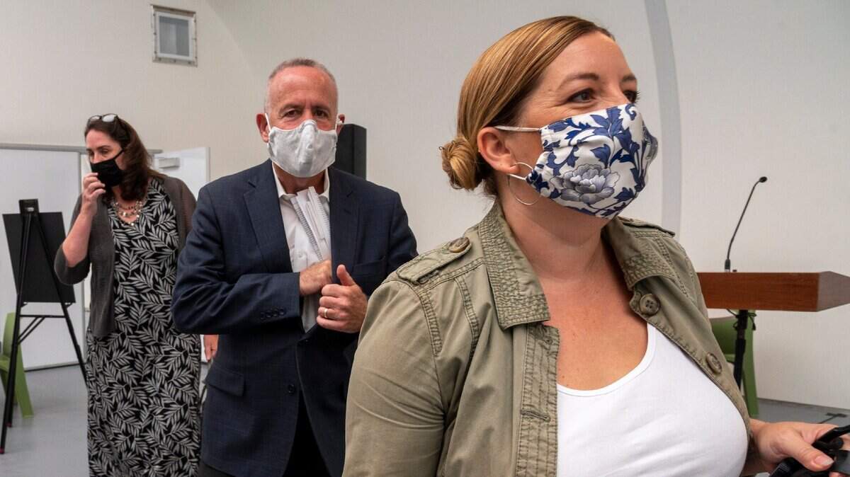 Sacramento City Councilwoman Angelique Ashby, right, seen with Mayor Darrell Steinberg, center, touring a Sprung shelter in Meadowview on Monday, Aug. 17, 2020. Ashby tested positive for COVID-19 on Thursday, April 21, 2022, she said.