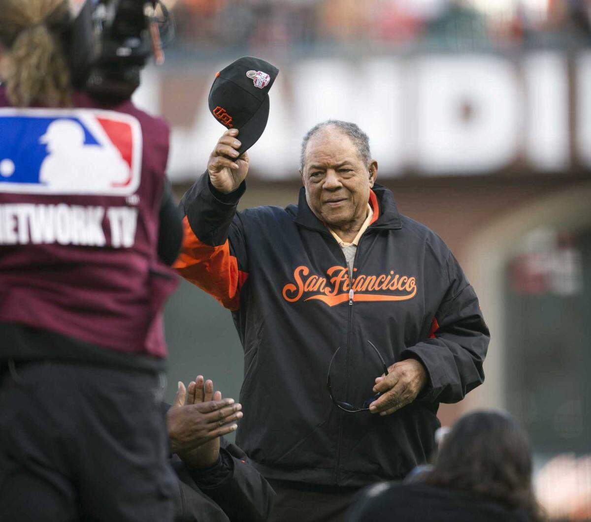 Giant legend Willie Mays tips his cap during pre-game introductions at Game 1 of the 2012 World Series between the San Francisco Giants and the Detroit Tigers at AT&T Park in San Francisco, California. The Hall of Famer center fielder and a slugging icon died Tuesday, June 18, 2024, at the age of 93, the Giants organization announced.