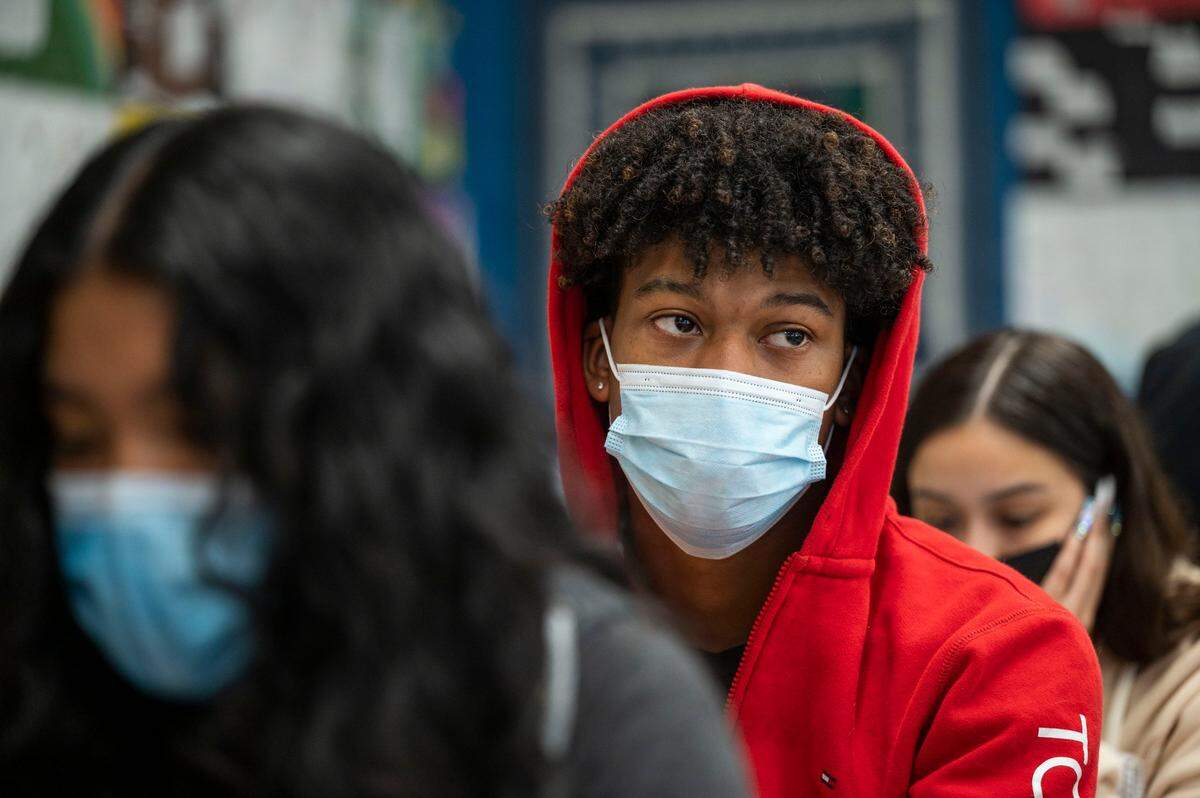 Luther Burbank High School senior Josiah Baker-West looks at a writing assignment in his English class on April 4 as students, teachers and staff returned to campus in the Sacramento City Unified School District after an eight-day strike.