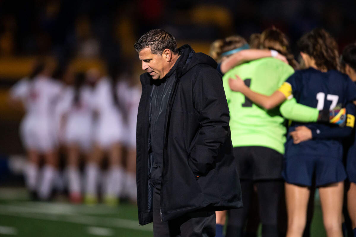 Oak Ridge Trojans’ head coach Rino Chimienti walks to the sideline after the end of overtime against the Buchanan Bears, bringing up penalty kicks, at the high school girls soccer CIF NorCal Division I championship game Saturday, March 5, 2022, at Oak Ridge High School in El Dorado Hills.