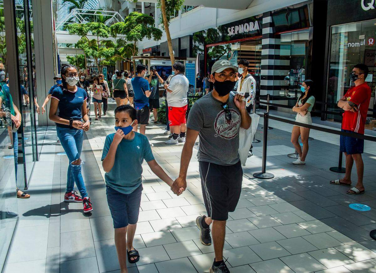 Visitors to Arden Fair mall wear masks as they shop on Tuesday, June 23, 2020. 