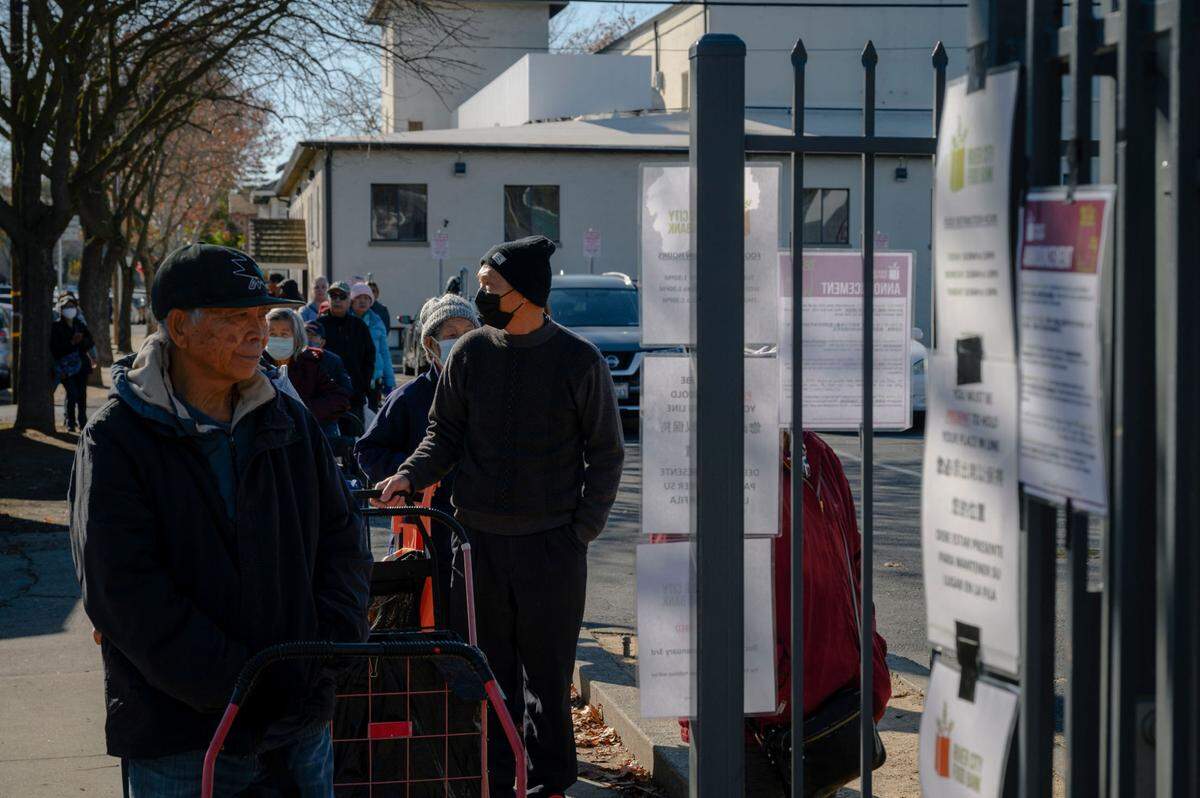 People line up outside River City Food Bank in Sacramento in December. In recent years, California has ranked among the lowest of any state in the percentage of eligible seniors receiving food stamps.