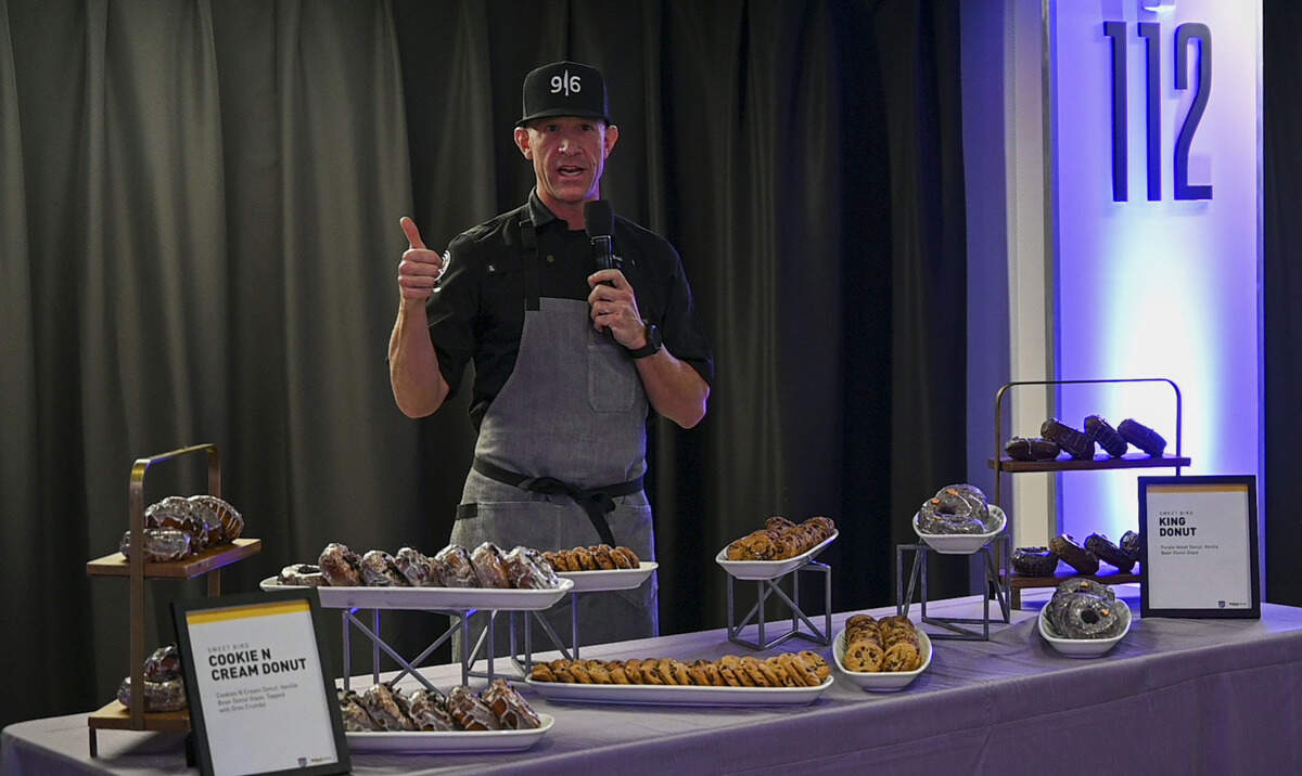 Brien Kuznicki, Golden 1 Center Executive Chef, shows off some new desserts including Kings Donuts from Sweet Bird at the Media Food Tasting on Thursday.