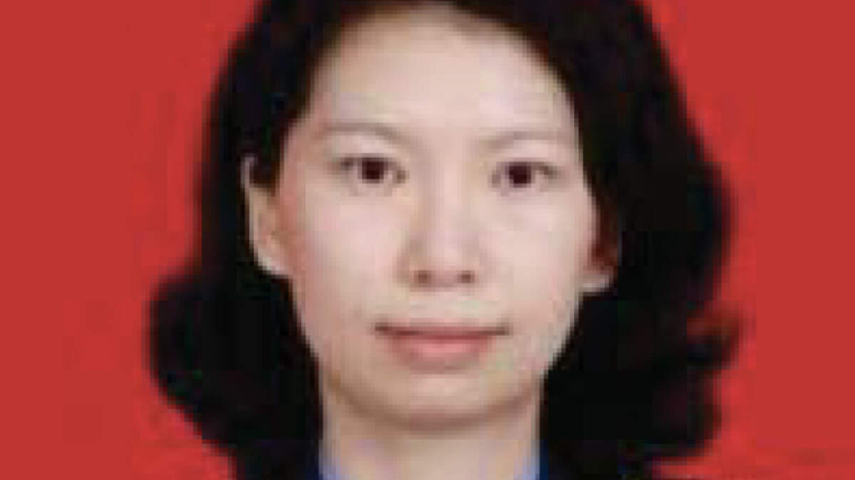 A photo from a criminal complaint filed in U.S. District Court shows Tang Juan in a military uniform. She has been charged in federal court in Sacramento with lying about her ties to the Chinese military and Communist Party.