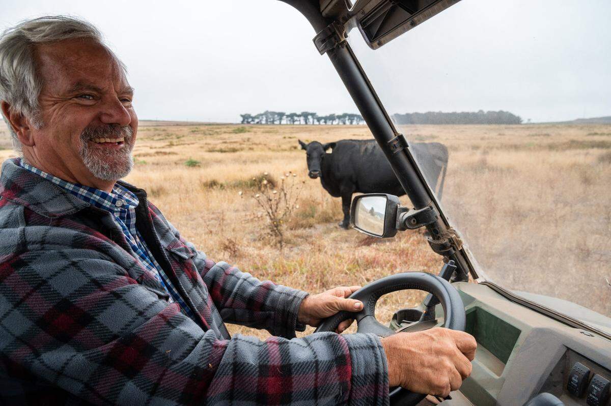Kevin Lunny drives on his Point Reyes ranch. A new National Park Service plan would extend leases for dairy and beef cattle ranches at the seashore from five years to 20.