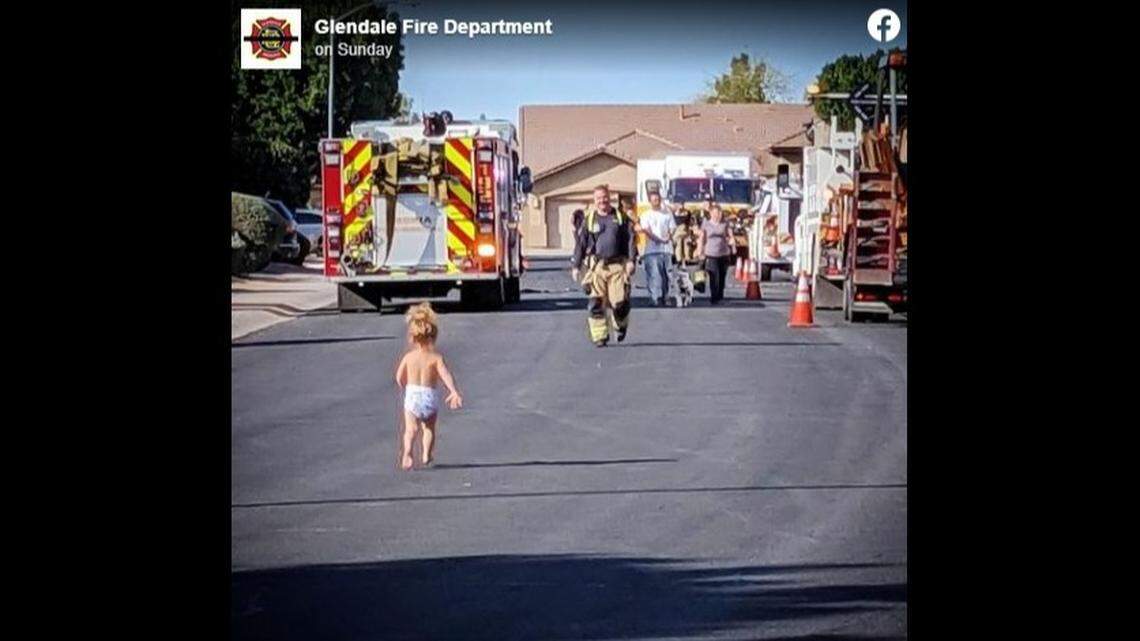 A photo of a toddler running to her firefighter dad in Arizona is warming hearts on Facebook.