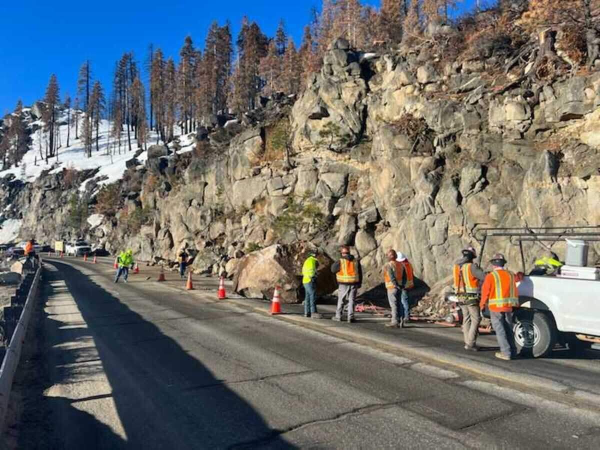 A large boulder fell off of Echo Summit Wednesday March 16, 2022, morning onto the Highway 50 mountain pass in El Dorado County, blocking traffic in both directions.