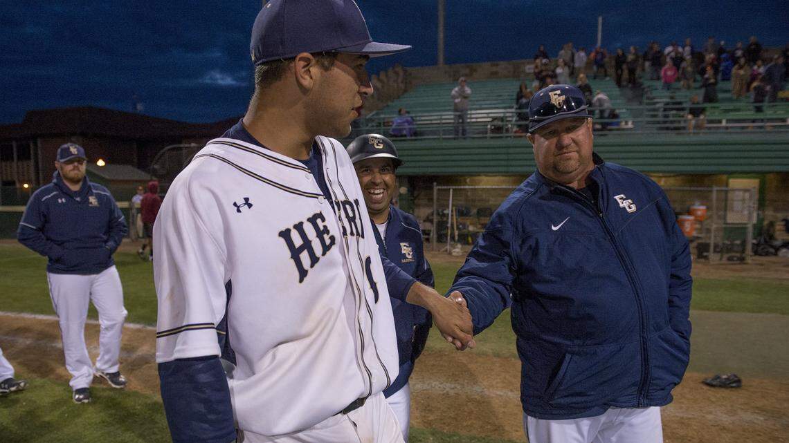 Jeff Carlson, right, won nine Sac-Joaquin Section baseball championships at Elk Grove, including three with son Dylan, left, a first-round pick in 2016 to St. Louis.