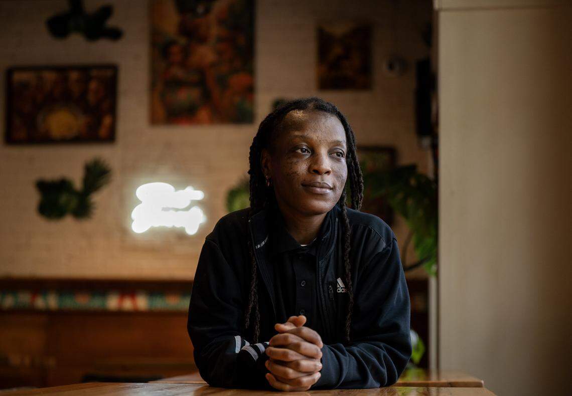 Sayeah "Pinky" Mayson, owner of AfroEatz in midtown Sacramento, poses for a portrait at her restaurant on Dec. 4.