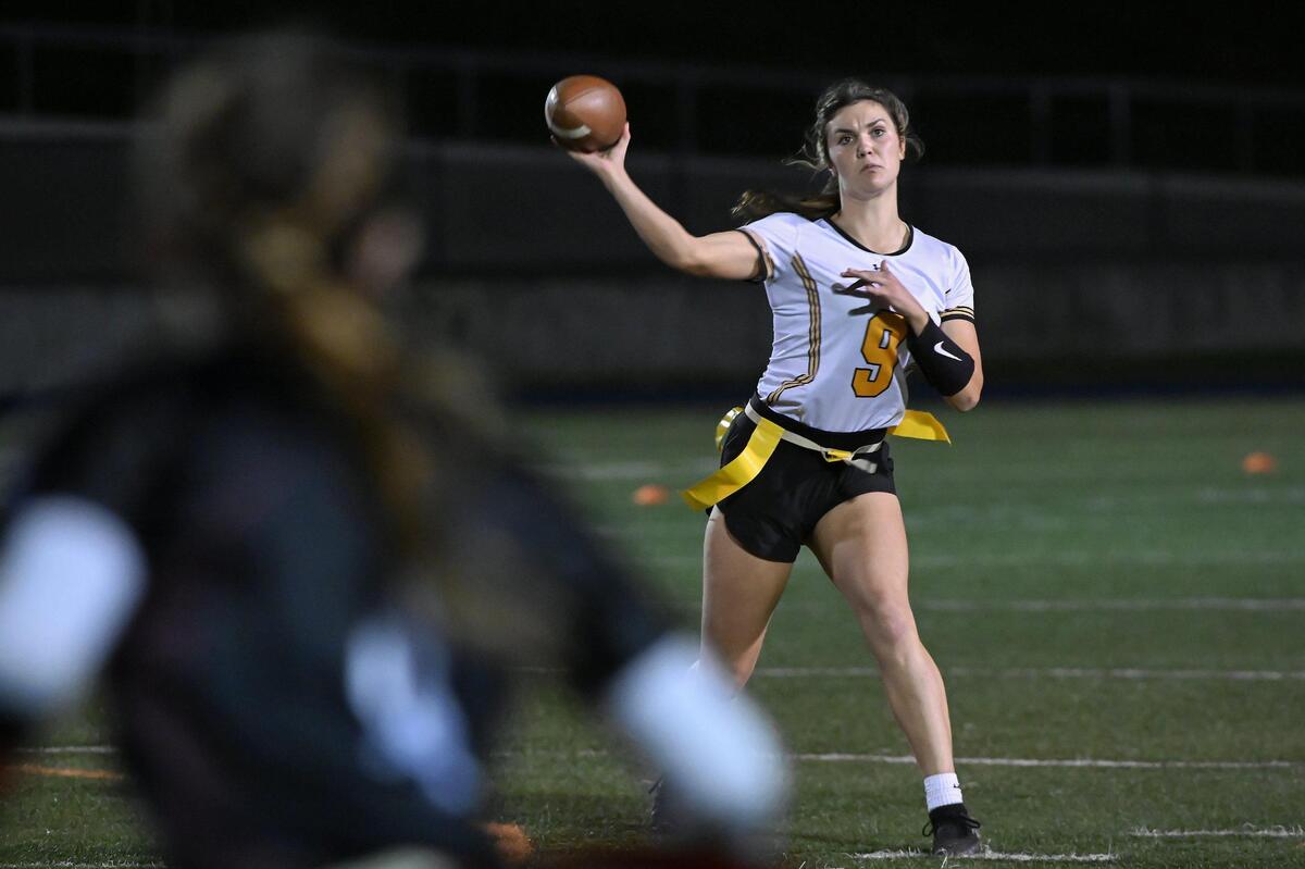 Del Oro Golden Eagles quarterback Delaney Osborne (9) passes for a 10-yard gain in the second half of the CIF Sac-Joaquin Division I flag football championship on Saturday at Cosumnes River College in Sacramento.
