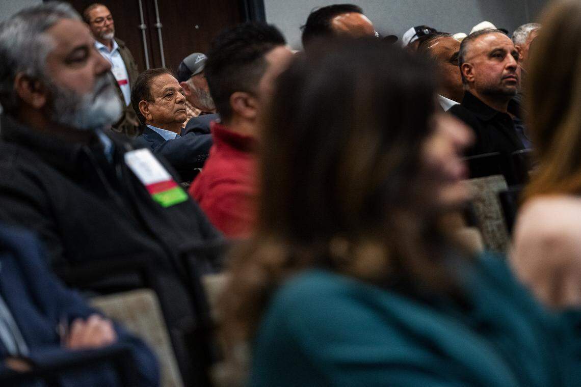 Sarb Johl, left, seated in back, was among a packed room of concerned peach farmers at the California Canning Peach Association’s annual meeting in Sacramento on Feb. 4. Del Monte, the national seller of packaged and canned fruits and vegetables, filed for bankruptcy in July, causing havoc among peach growers who had depended on its production facility in Modesto.