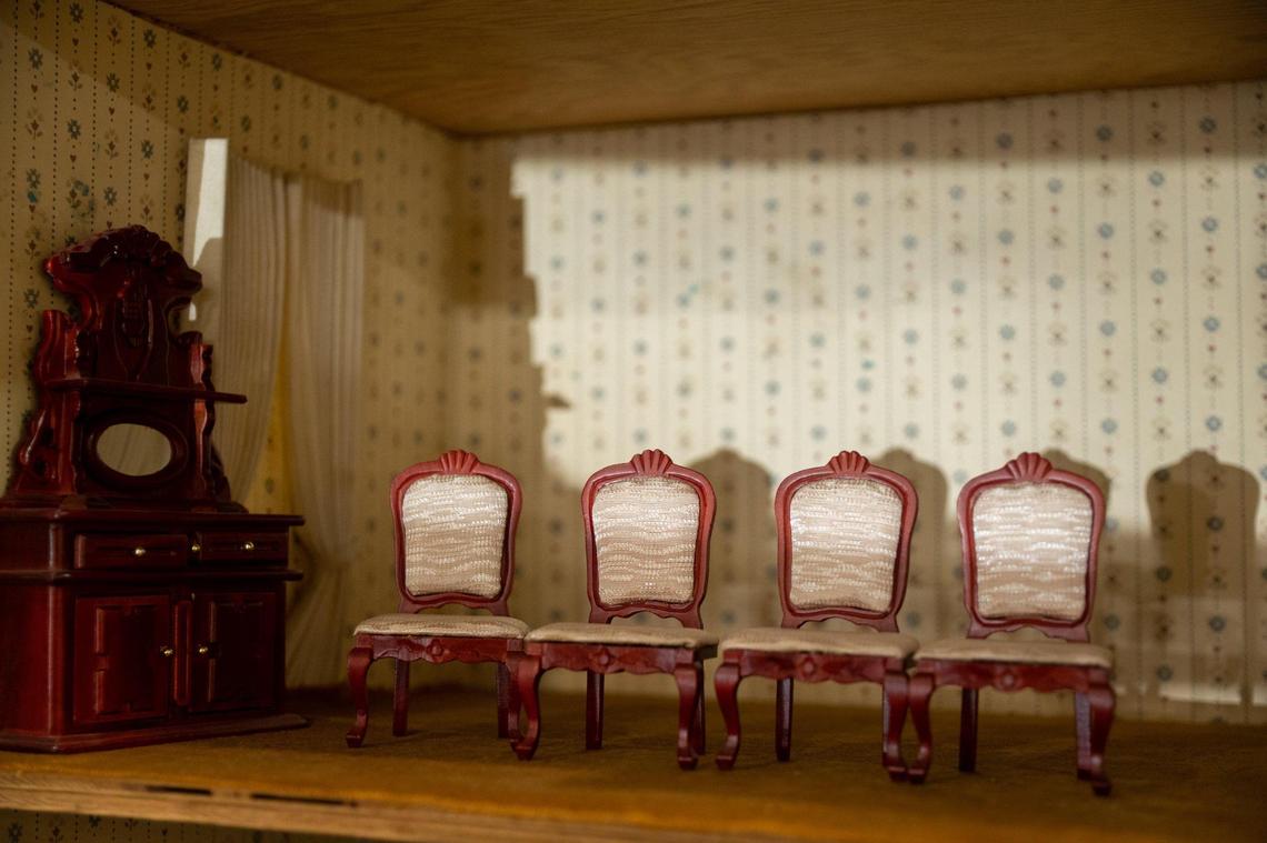Miniature furniture is displayed inside of a dollhouse room at The Elegant Dollhouse in Arden Arcade on Thursday, Aug. 25, 2022. Barbara Taplin has owned the business for over 40 years.