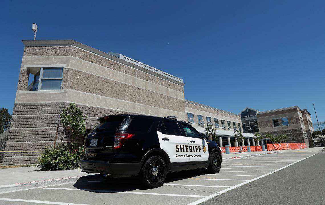 A Contra Costa County Sheriff’s vehicle is parked in front of the West County Detention Center in Richmond in 2018.