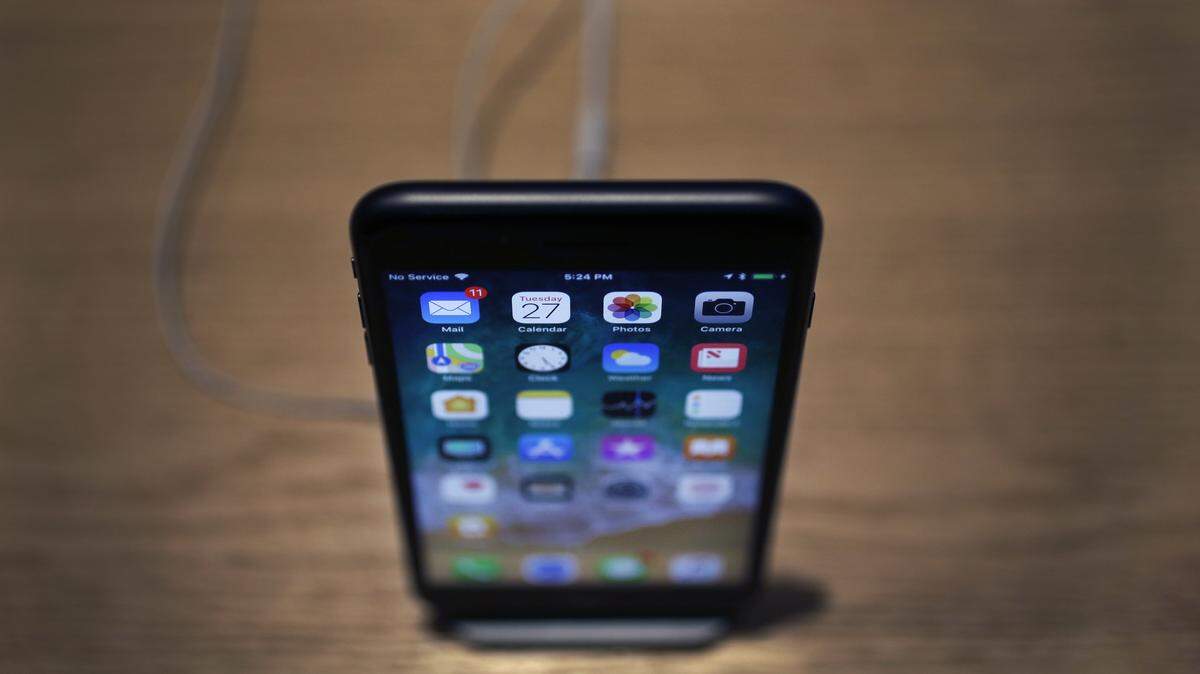 An Apple iPhone X on display during an Apple event at their main store Tuesday, March 27, 2018, in Chicago.