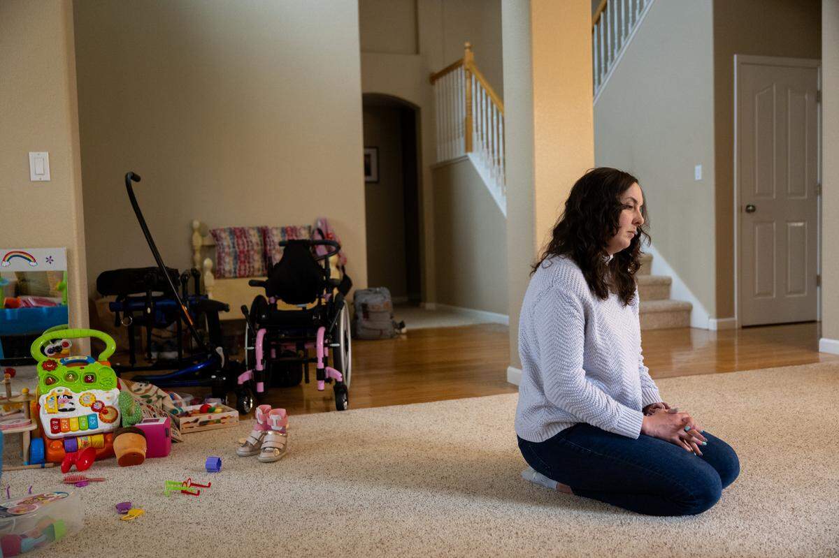 Frances Pimentel sits in her the living room at home earlier this month in Folsom.