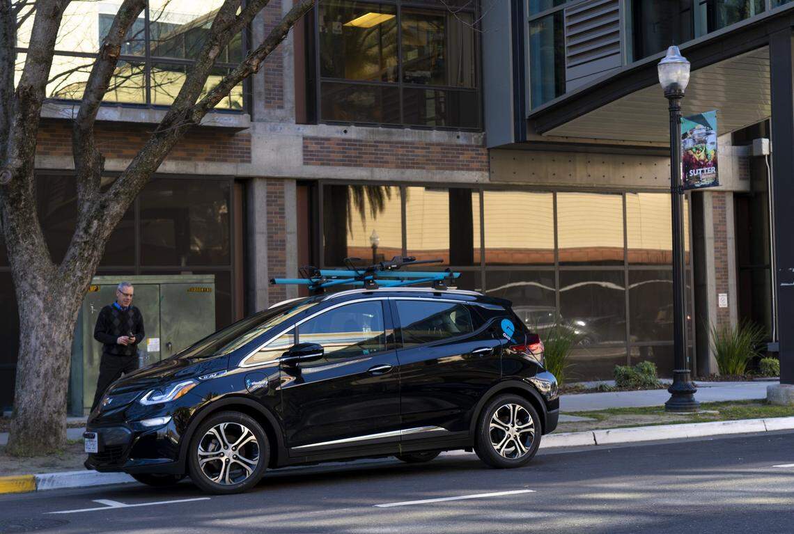 A Gig electric car awaits rental in downtown Sacramento in 2019, soon after the service’s introduction. The all-electric Chevy Bolts disappeared from city streets in February 2023.