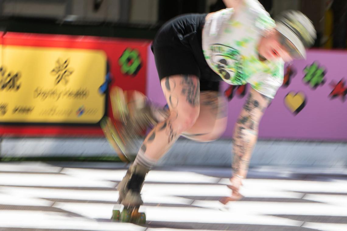 Samantha Hill spins around the Downtown Roller Rink during the facility’s grand opening in downtown Sacramento’s Ali Youssefi Square on Friday, June 28, 2024. “I feel like roller skating has been kind of in the back of people’s minds for a while, and it’s nice to see it coming forward again,” Hill said.