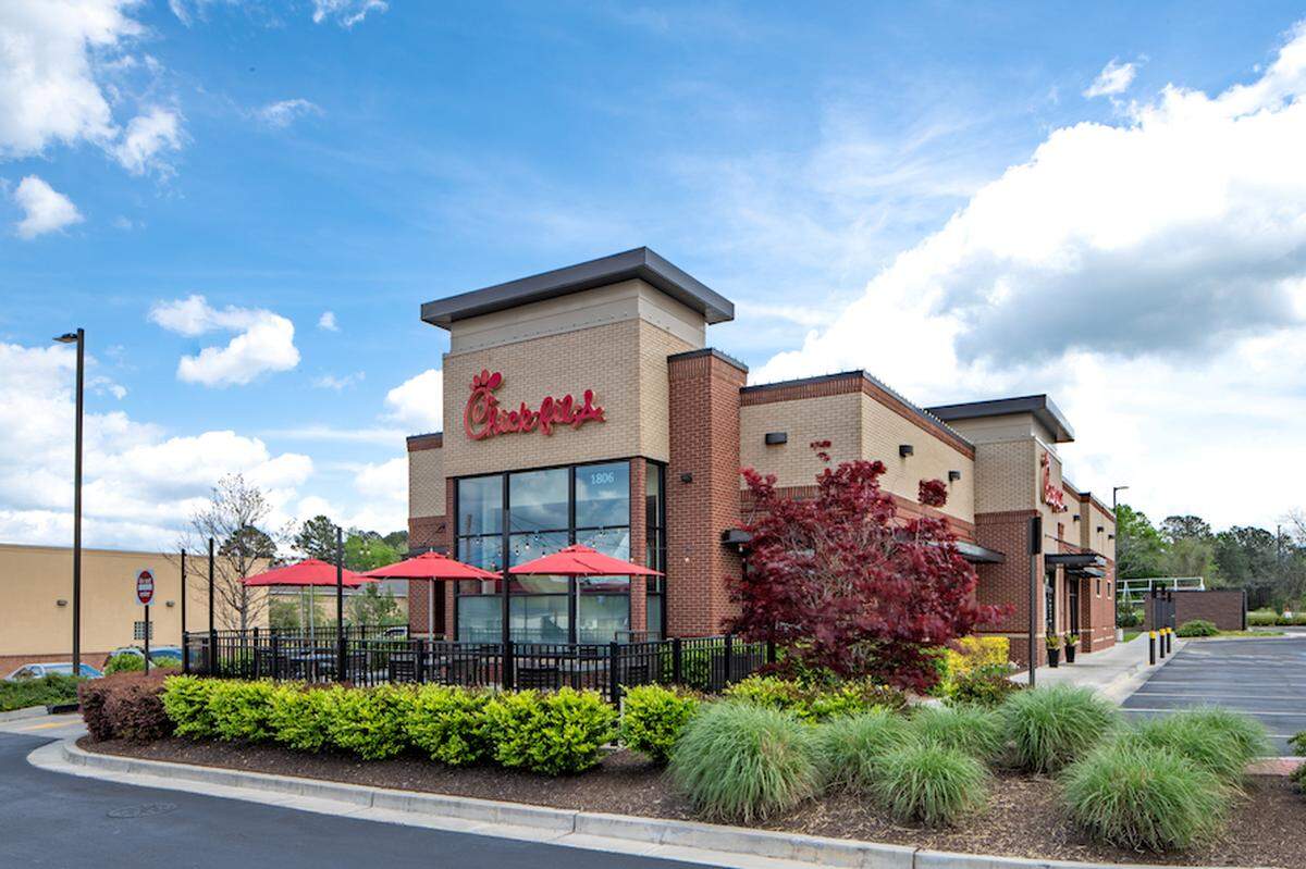 A Chick-fil-A fast food restaurant with a drive-thru.