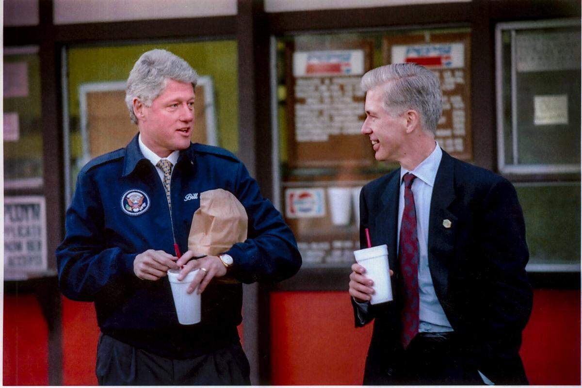 President Bill Clinton talks with Lt. Gov. Gray Davis in front of the Archway Frostie in Rio Linda on Jan. 17, 1995. Clinton and Davis were in Rio Linda to assess damage from flooding.