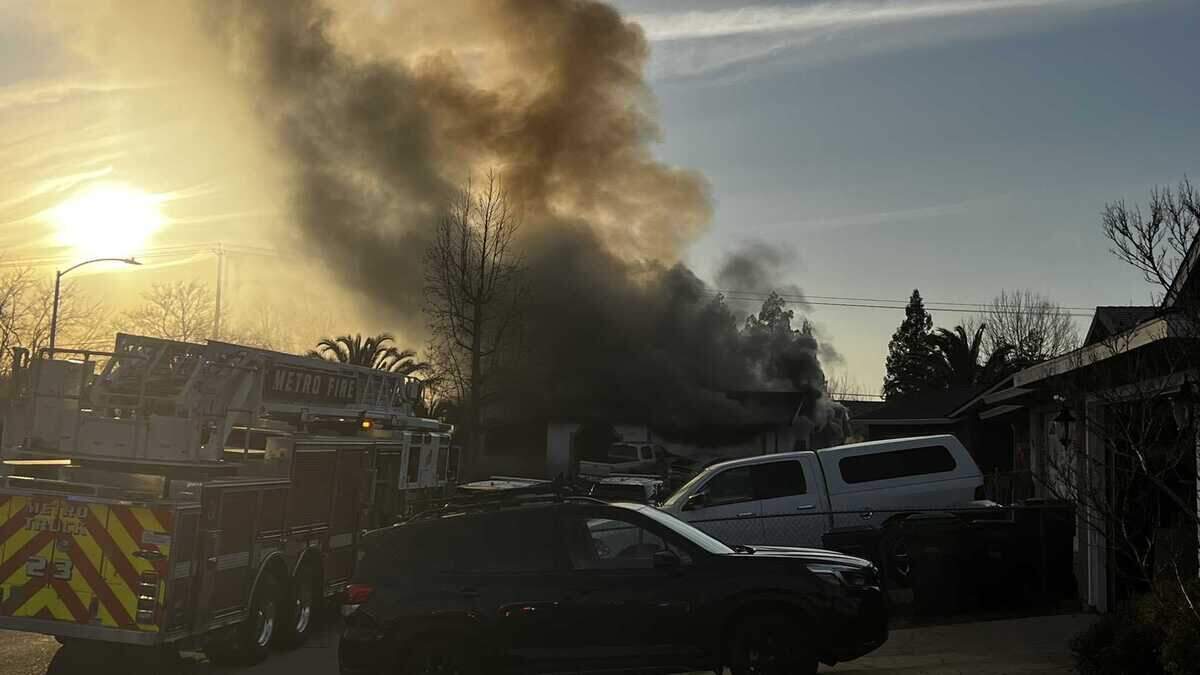 Firefighters on Tuesday Feb. 7, 2023, respond to a house fire where a man was found dead after he reportedly barricaded himself inside the home in the 2400 block of Covered Wagon Circle in Elverta, California.
