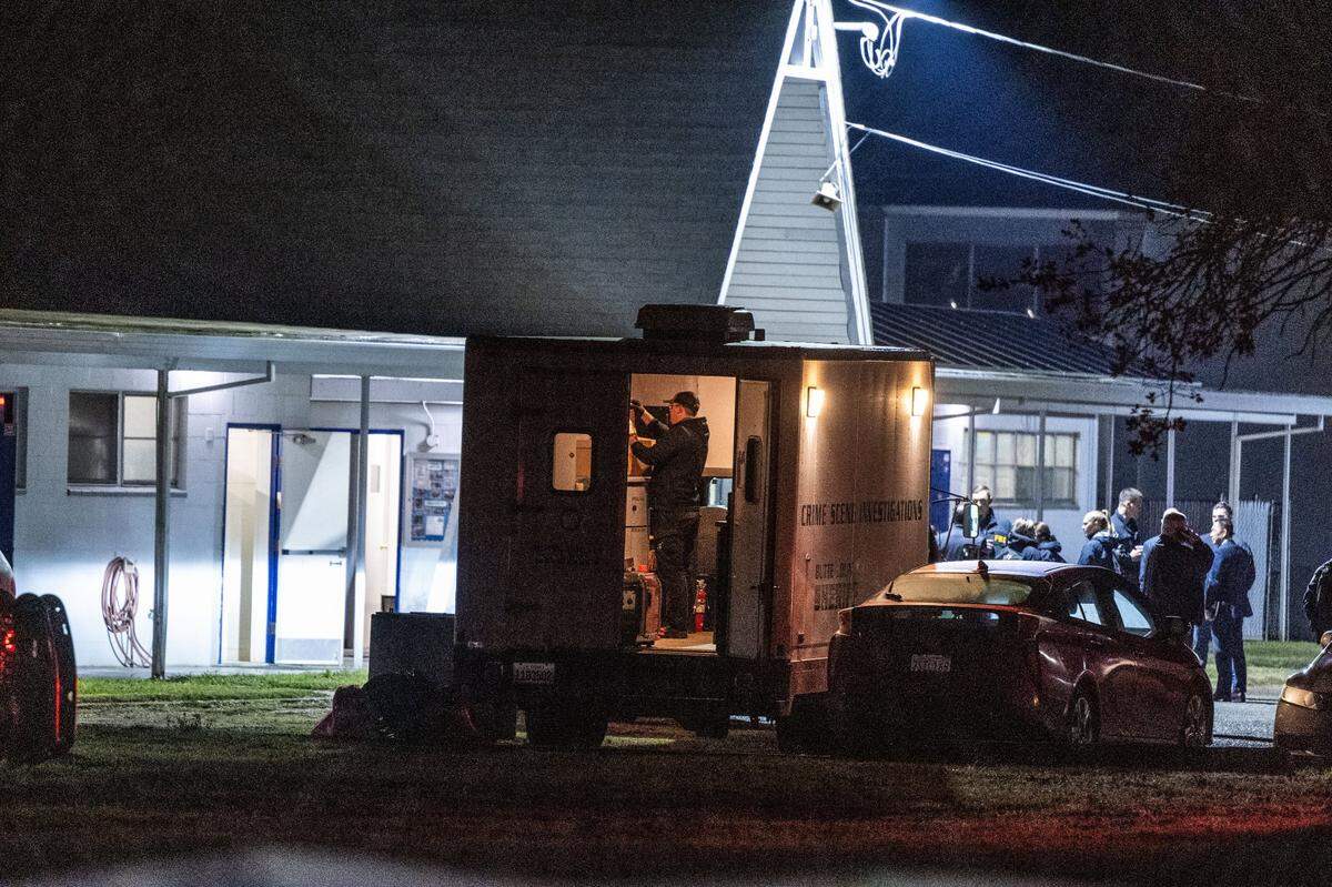 Crime scene investigators collect evidence at a shooting scene at Feather River Adventist School in Oroville on Wednesday, Dec. 4, 2024. Two boys were shot and are recovering at a Sacramento hospital, according to Butte County Sheriff Kory Honea.