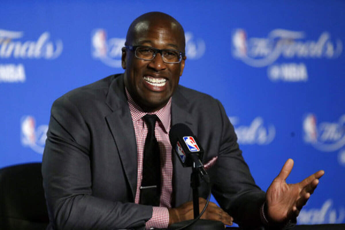 FILE - In this June 1, 2017, file photo, Golden State Warriors interim head coach Mike Brown answers questions during a news conference after Game 1 of basketball’s NBA Finals against the Cleveland Cavaliers in Oakland, Calif. Brown has a do-for-others nature and as the Warriors host Cleveland on Christmas Day everyone will remember exactly what he did to help guide Golden State to a second title in three years last June as he filled in for ailing head coach Steve Kerr. (AP Photo/Ben Margot, File)