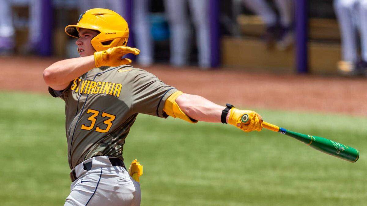 Catcher Logan Sauve (33) connects at the plate as West Virginia faces LSU in Game 1 of the 2025 NCAA Division I Super Regional in Baton Rouge, La., on June 7. The Athletics selected Sauve in the seventh round with the 200th overall pick in the 2025 MLB draft.
